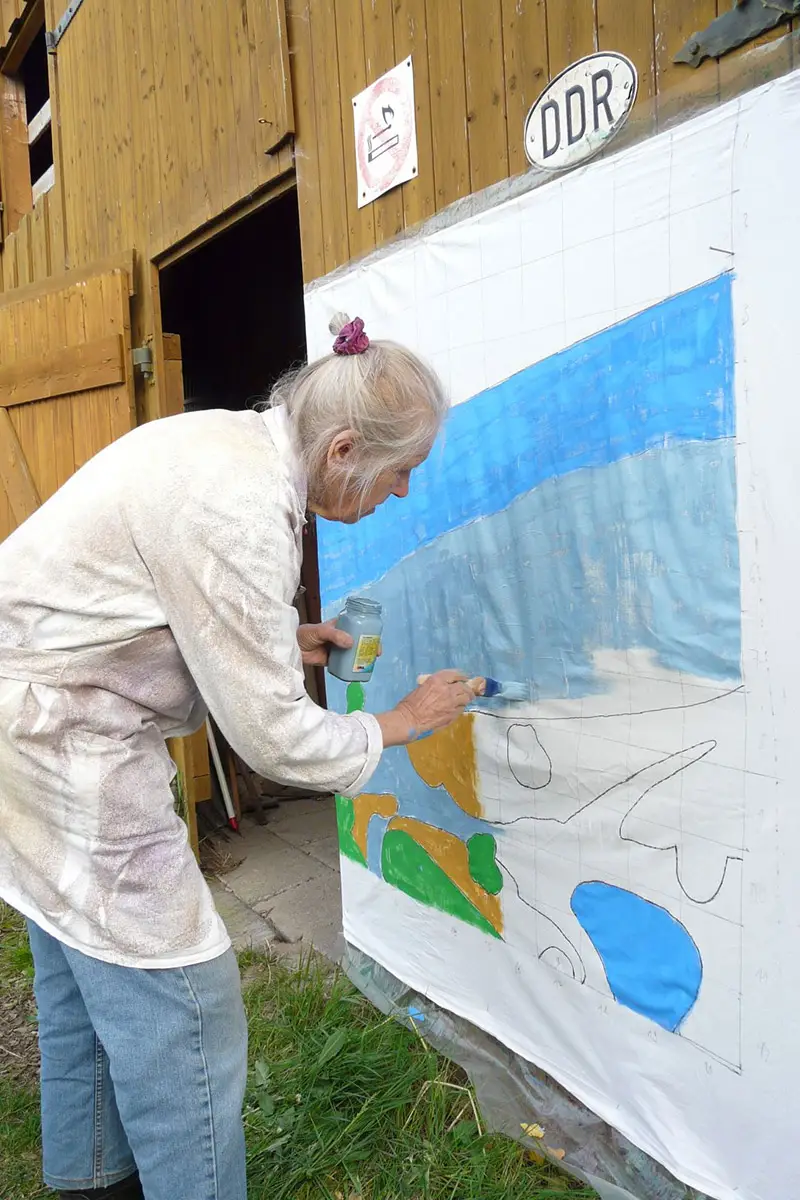 Kunstaktion Planet des Friedens – Malen an der Wand Malen an einer Wand